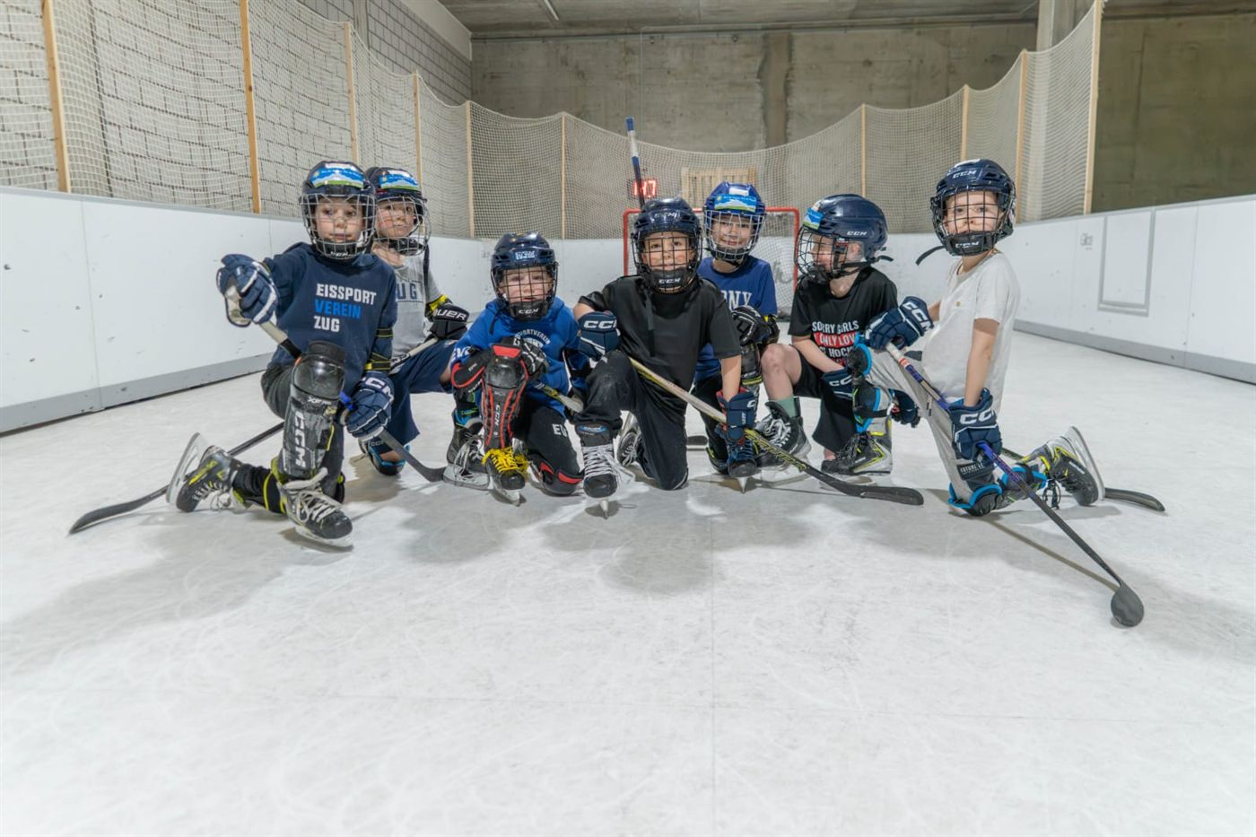 Kids team in full gear on the Glice ice